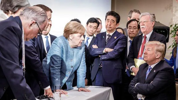 Lo que se esconde detrás de la icónica imagen de Merkel versus Trump en el G7
