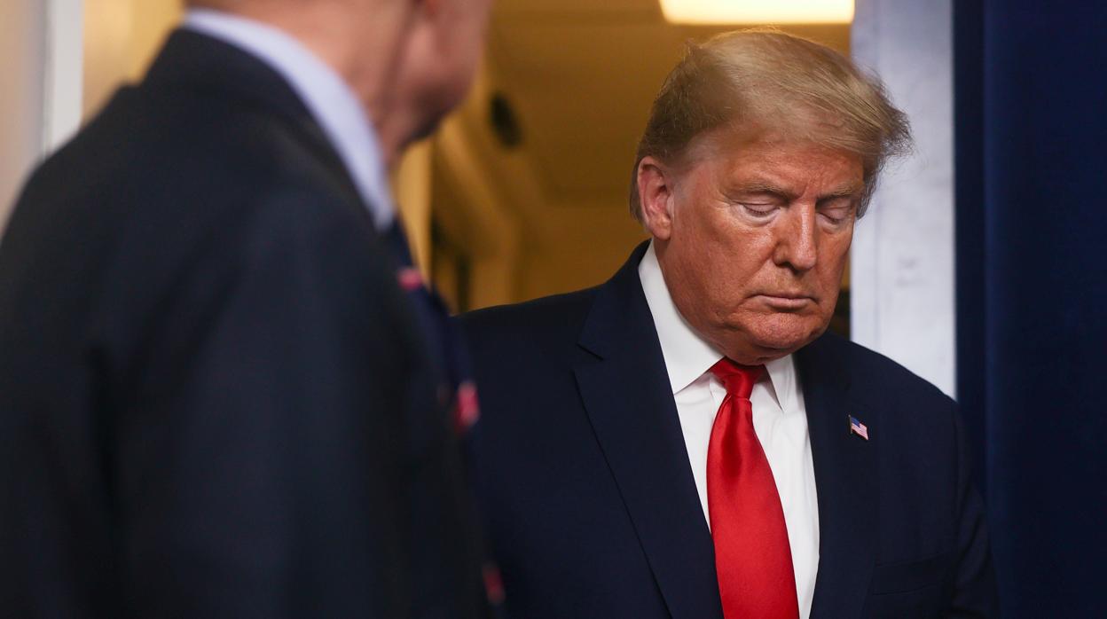 El presidente Trump con Mike Pence, antes de la rueda de prensa en la Casa Blanca