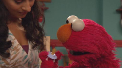 Elmo despidiendose de su chupete