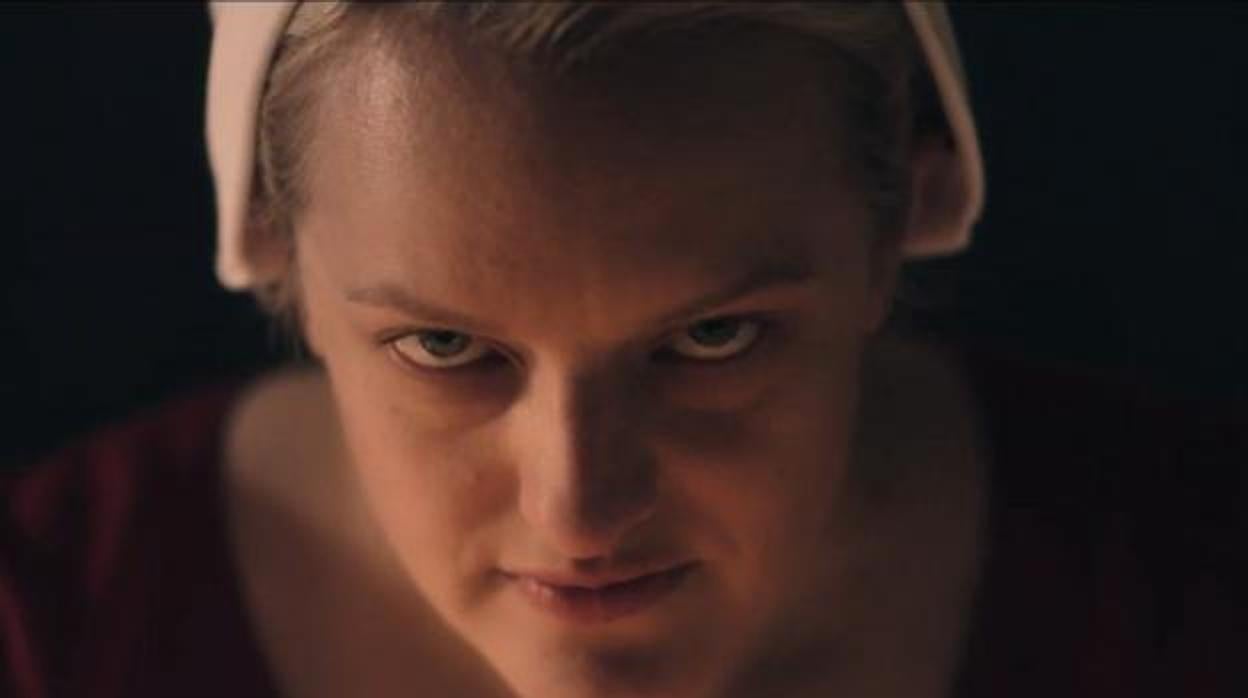 June (Elisabeth Moss)