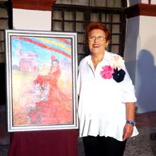 Castillo Sánchez junto a su obra que sirve de cartel de la Feria y Fiestas Patronales de Lebrija 2018