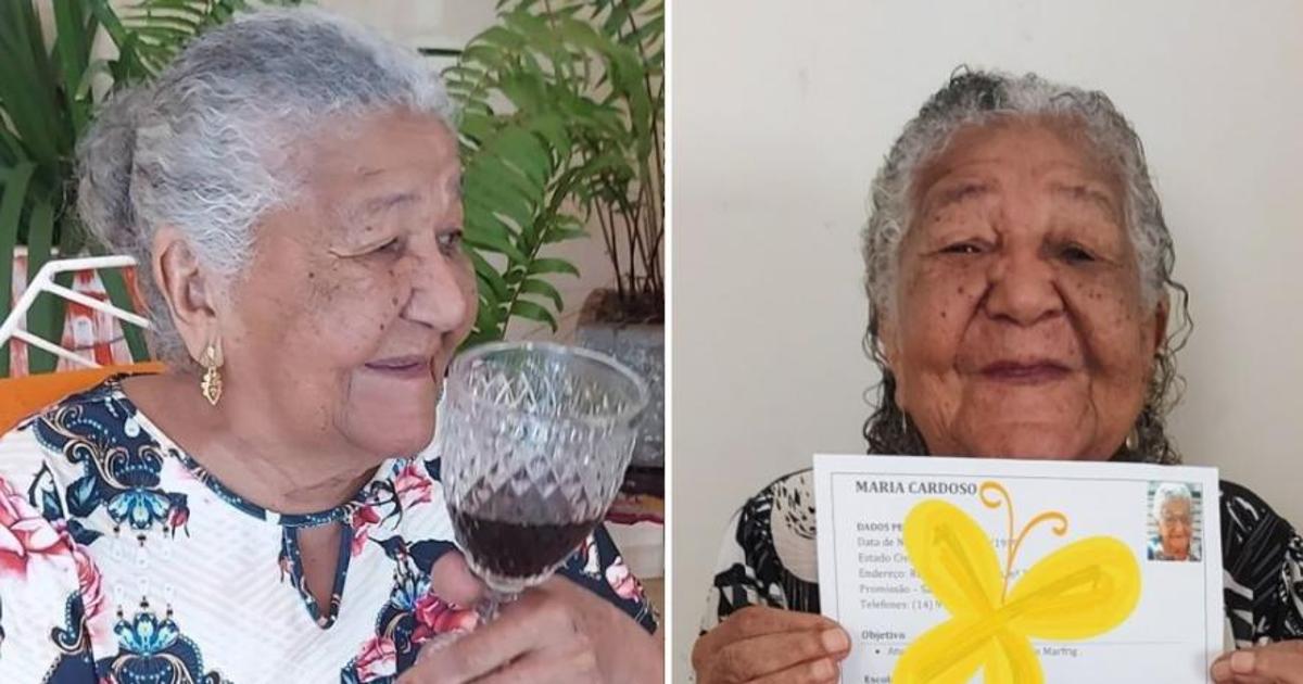 María Cardoso tomando vino y con su currículo