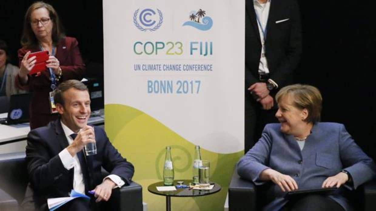 Macron y Merkel, ayer en la reunión sobre el cambio climático en Bonn