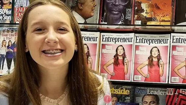 Alina Morse, de 13 años, posa con una piruleta saludable en la mano, el producto que la ha hecho millonaria