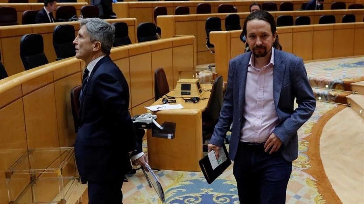 El ministro del Interior, Fernando Grande-Marlaska, junto al vicepresidente segundo del Gobierno, Pablo Iglesias